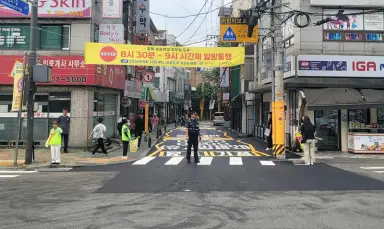 등굣길 30분, 차보다 아이 먼저… 홍제초 앞 ‘시간제 일방통행’